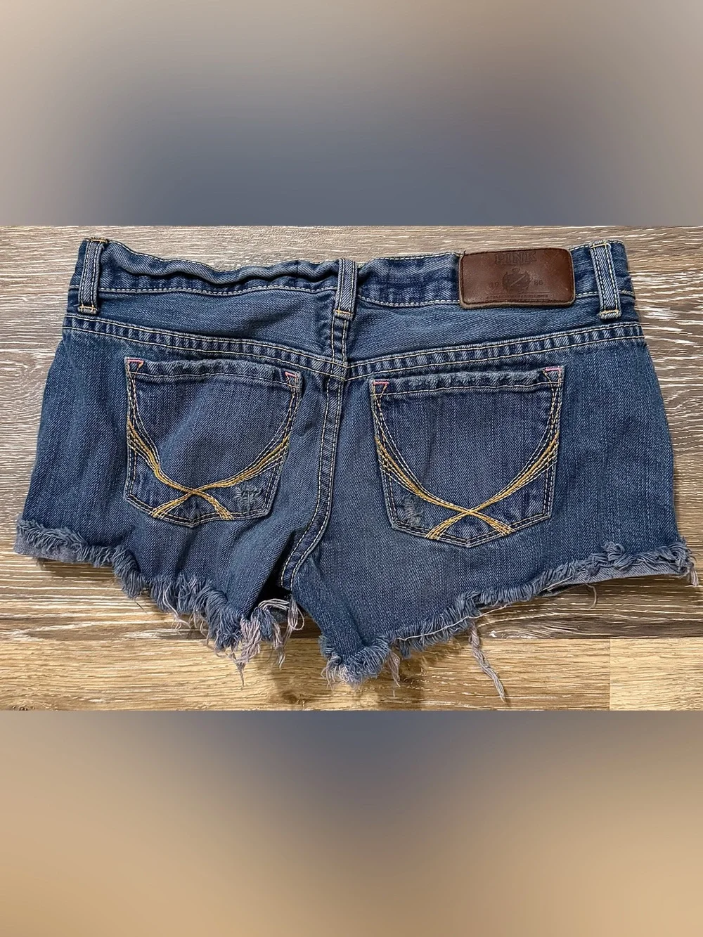 VTG 2005-2007 PINK Victoria's Secret Dark Blue Distressed Denim Low Rise Shorts - Picture 2 of 4
